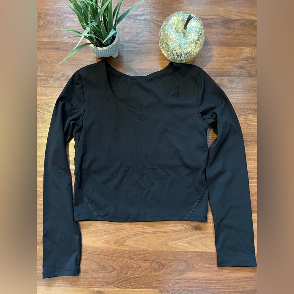 First Health athletic apparel. Enhance Crop Top, brand New Never Used.